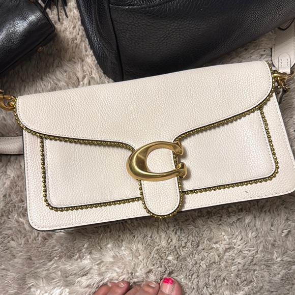 Elegant White Leather Bag with Gold Accents - Picture 1 of 3